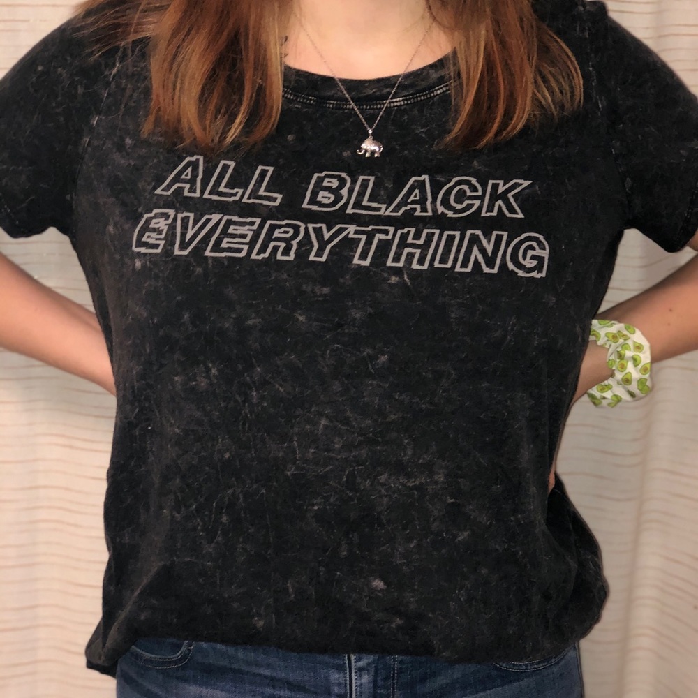 Black tshirts. One has multi colors